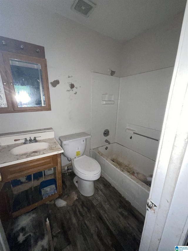 375 Little Dismal Rd, Arley, AL 35541 - full bath with vanity, wood finished floors, toilet, and shower / tub combination