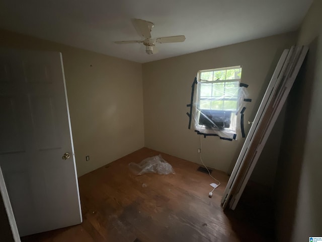 375 Little Dismal Rd, Arley, AL 35541 - unfurnished bedroom featuring wood finished floors and a ceiling fan
