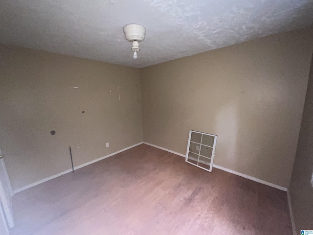 375 Little Dismal Rd, Arley, AL 35541 - unfurnished room featuring baseboards and wood finished floors