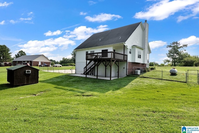 200 Shady Point Rd, Locust Fork, AL 35097 - rear view of property featuring a deck, a chimney, stairway, cooling unit, and a patio area