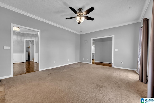 200 Shady Point Rd, Locust Fork, AL 35097 - unfurnished bedroom with carpet floors, crown molding, baseboards, ceiling fan, and a textured ceiling