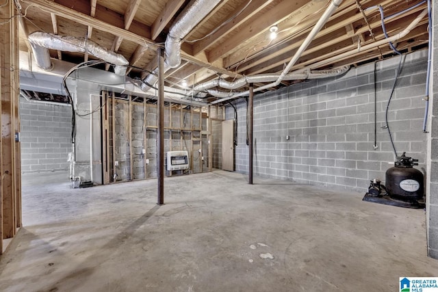 200 Shady Point Rd, Locust Fork, AL 35097 - unfinished below grade area featuring heating unit and concrete block wall