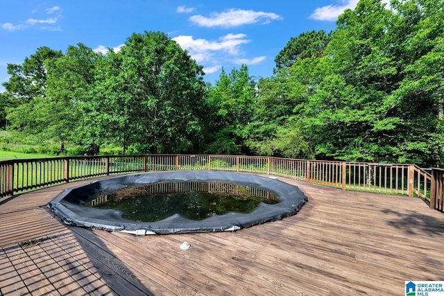 200 Shady Point Rd, Locust Fork, AL 35097 - wooden deck with a covered pool