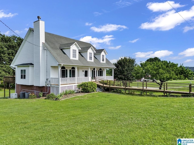 200 Shady Point Rd, Locust Fork, AL 35097 - cape cod-style house featuring covered porch, a front lawn, a shingled roof, and a chimney