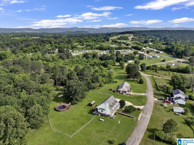200 Shady Point Rd, Locust Fork, AL 35097 - drone / aerial view of a heavily wooded area and a mountain backdrop