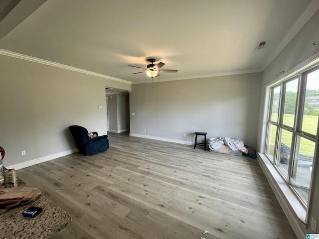 796 Michelle Mnr, Montevallo, AL 35115 - unfurnished living room with crown molding, ceiling fan, and wood finished floors