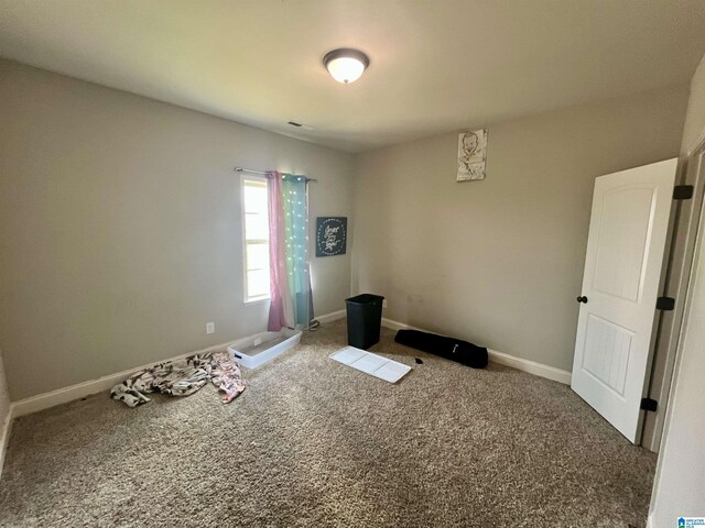 796 Michelle Mnr, Montevallo, AL 35115 - carpeted empty room featuring baseboards