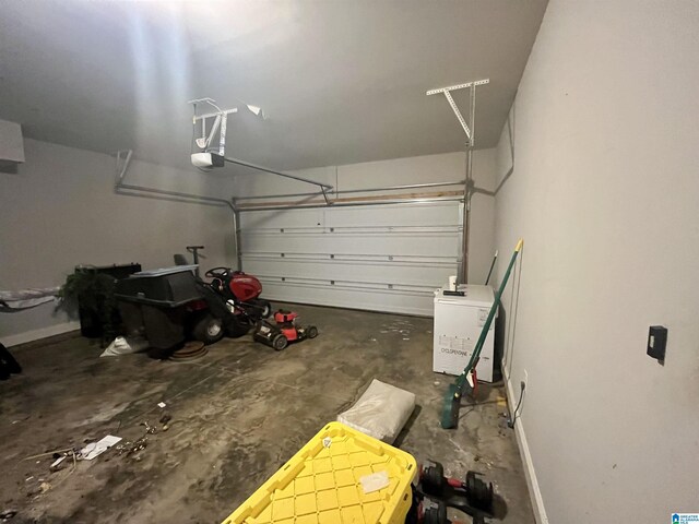 796 Michelle Mnr, Montevallo, AL 35115 - garage featuring a garage door opener and baseboards