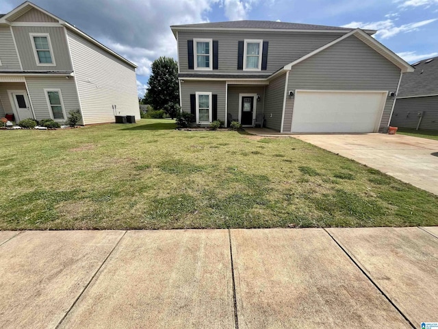 796 Michelle Mnr, Montevallo, AL 35115 - traditional-style home featuring driveway, a front lawn, and an attached garage