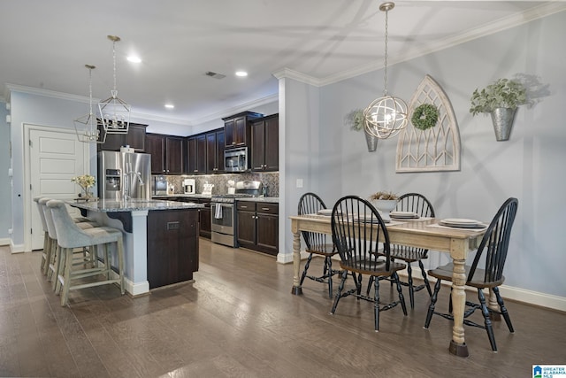 1037 Norman Way, Birmingham, AL 35242 - dining room with a chandelier, crown molding, baseboards, dark wood finished floors, and recessed lighting