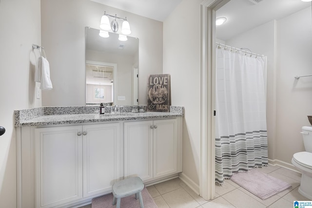 1037 Norman Way, Birmingham, AL 35242 - bathroom featuring toilet, vanity, tile patterned flooring, baseboards, and curtained shower