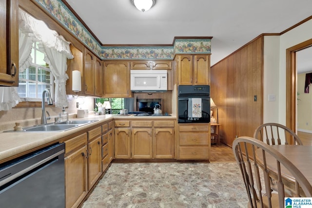 5420 Pine St, Sylvan Springs, AL 35118 - kitchen with white appliances, a sink, healthy amount of natural light, light countertops, and ornamental molding