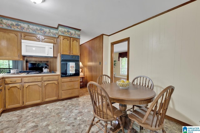 5420 Pine St, Sylvan Springs, AL 35118 - dining room featuring light stone finish floors and ornamental molding