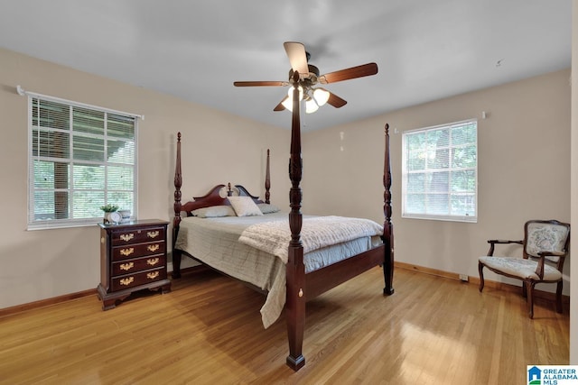 5420 Pine St, Sylvan Springs, AL 35118 - bedroom with light wood-style floors, baseboards, and ceiling fan