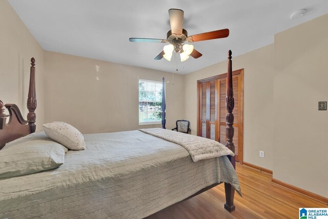 5420 Pine St, Sylvan Springs, AL 35118 - bedroom with light wood-style floors, baseboards, a closet, and ceiling fan