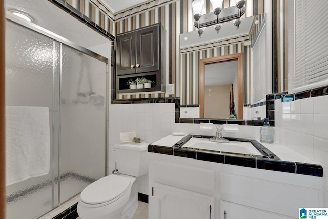 5420 Pine St, Sylvan Springs, AL 35118 - full bathroom featuring toilet, a shower stall, vanity, tasteful backsplash, and tile walls