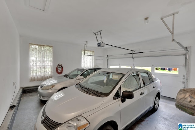 5420 Pine St, Sylvan Springs, AL 35118 - garage featuring a garage door opener