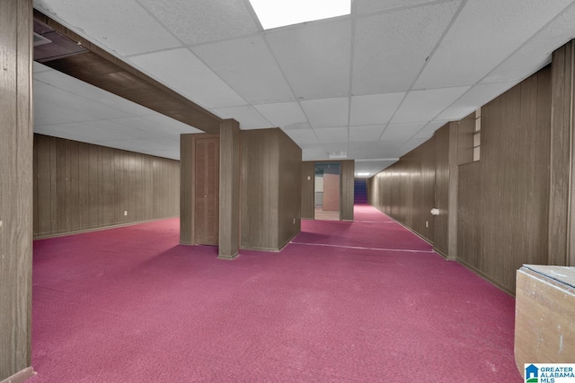 5420 Pine St, Sylvan Springs, AL 35118 - finished basement with wooden walls, carpet floors, and a drop ceiling