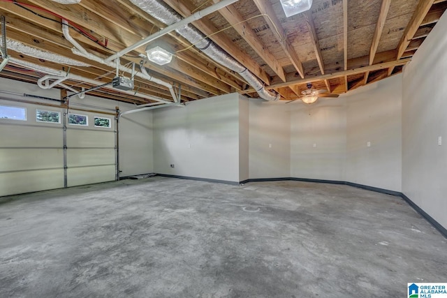 401 High Pointe Dr, Hayden, AL 35079 - garage with a garage door opener and baseboards