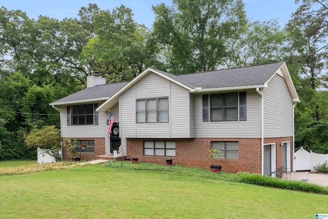 860 Torrey Pines Cir, Clay, AL 35215 - raised ranch with brick siding, an attached garage, a chimney, driveway, and a shingled roof