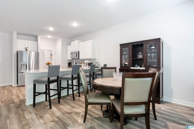 119 Polo Downs, Chelsea, AL 35043 - dining room featuring light wood-style flooring, baseboards, and recessed lighting