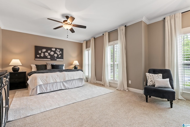 5265 Lake Crest Cir, Hoover, AL 35226 - bedroom featuring ornamental molding, multiple windows, light carpet, ceiling fan, and baseboards