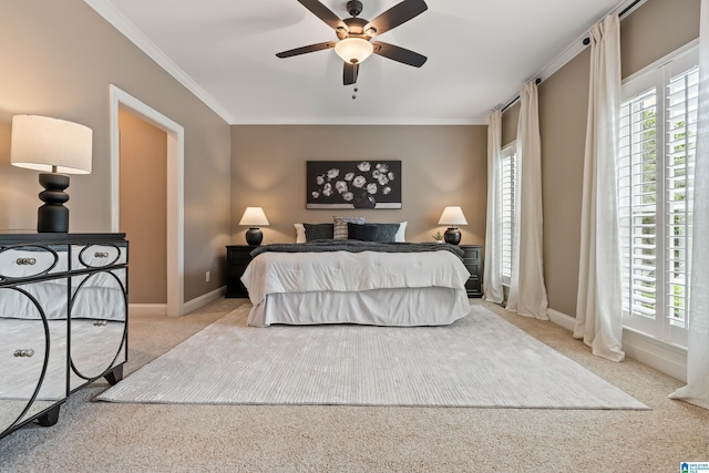 5265 Lake Crest Cir, Hoover, AL 35226 - carpeted bedroom featuring multiple windows, crown molding, baseboards, and ceiling fan