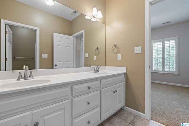 5265 Lake Crest Cir, Hoover, AL 35226 - full bath with double vanity, baseboards, and tile patterned flooring