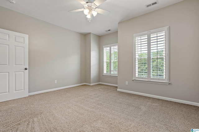 5265 Lake Crest Cir, Hoover, AL 35226 - spare room with carpet flooring, ceiling fan, and baseboards