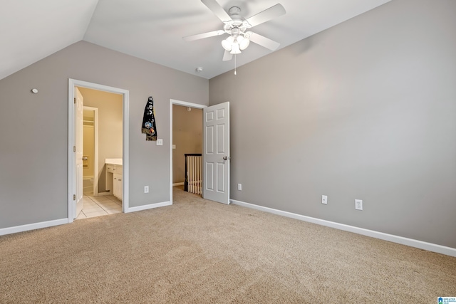 5265 Lake Crest Cir, Hoover, AL 35226 - unfurnished bedroom with light carpet, lofted ceiling, baseboards, ensuite bathroom, and a ceiling fan