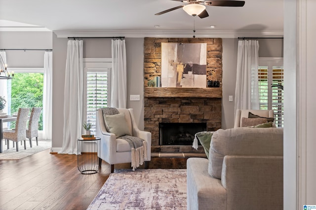 5265 Lake Crest Cir, Hoover, AL 35226 - living room featuring ceiling fan, crown molding, wood finished floors, a fireplace, and baseboards