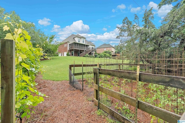 5265 Lake Crest Cir, Hoover, AL 35226 - view of grassy yard with a garden and a deck