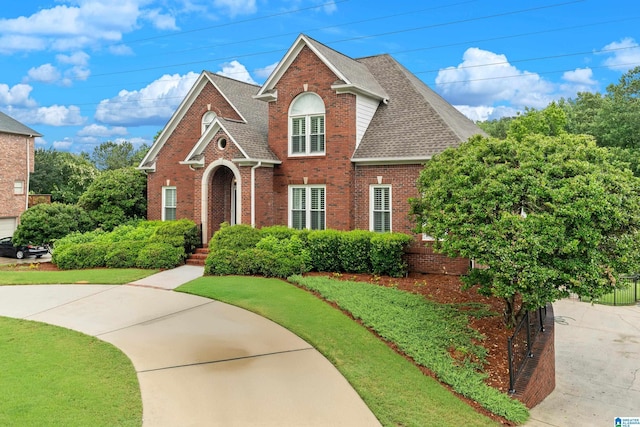 5265 Lake Crest Cir, Hoover, AL 35226 - view of front facade with brick siding and a shingled roof
