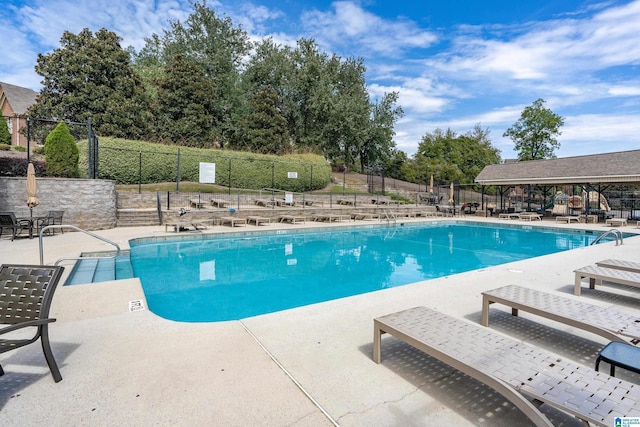 5265 Lake Crest Cir, Hoover, AL 35226 - community pool featuring a patio