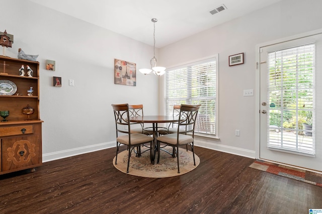 3096 Hidden Forest Cv, Montevallo, AL 35115 - dining space featuring dark wood finished floors, baseboards, and a chandelier