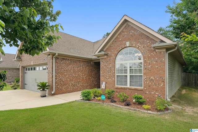 3096 Hidden Forest Cv, Montevallo, AL 35115 - view of front of house featuring brick siding, an attached garage, driveway, and a shingled roof