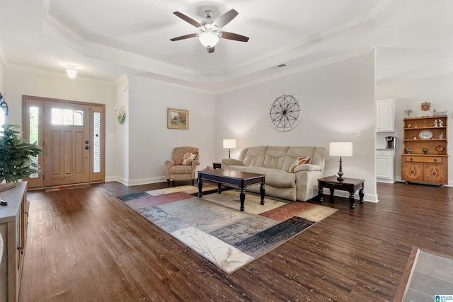 3096 Hidden Forest Cv, Montevallo, AL 35115 - living room featuring a raised ceiling, dark wood-type flooring, a ceiling fan, baseboards, and crown molding
