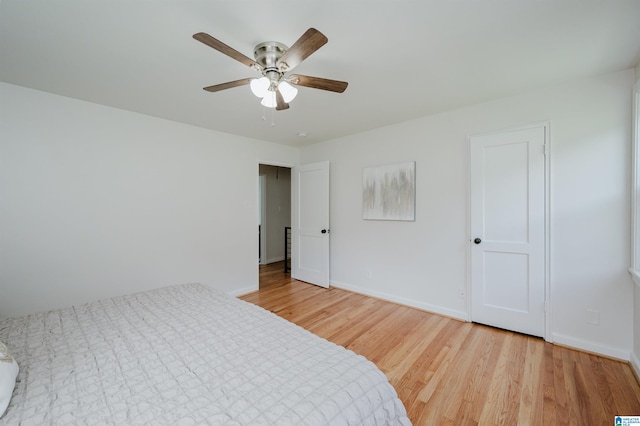 1751 Valley Ave Unit D, Homewood, AL 35209 - bedroom featuring wood finished floors, baseboards, and ceiling fan