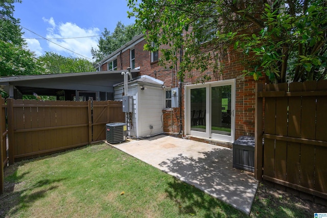 1751 Valley Ave Unit D, Homewood, AL 35209 - back of property featuring brick siding, central AC, and a patio area