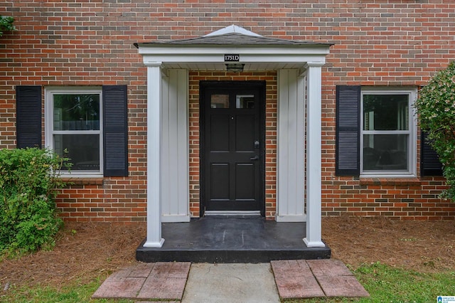 1751 Valley Ave Unit D, Homewood, AL 35209 - doorway to property featuring brick siding