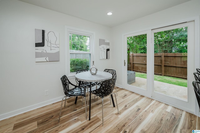 1751 Valley Ave Unit D, Homewood, AL 35209 - dining area featuring baseboards, light wood-style floors, and recessed lighting