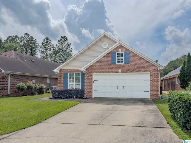 156 Brook Highland Cv, Birmingham, AL 35242 - view of front of property featuring brick siding, concrete driveway, a front yard, a garage, and central AC