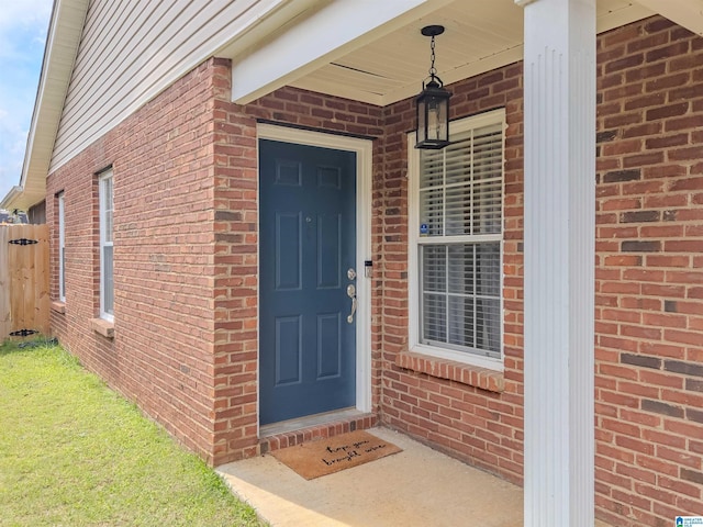 156 Brook Highland Cv, Birmingham, AL 35242 - view of exterior entry with brick siding and covered porch