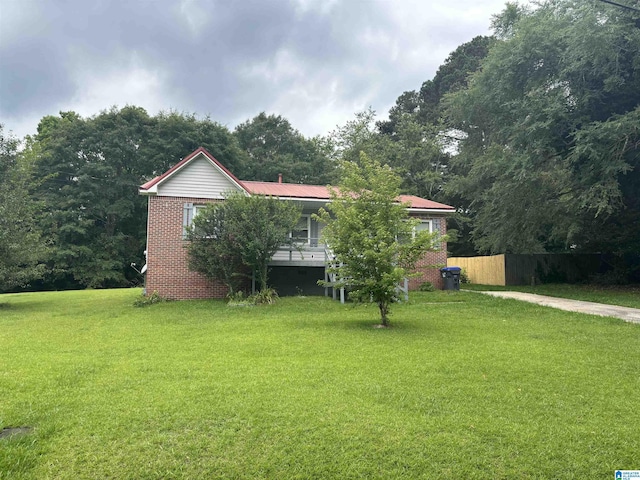 261 Ebenezer Rd, Odenville, AL 35120 - obstructed view of property with brick siding and metal roof