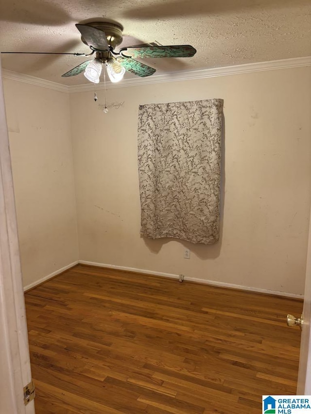 261 Ebenezer Rd, Odenville, AL 35120 - empty room featuring ceiling fan, wood finished floors, ornamental molding, a textured ceiling, and baseboards