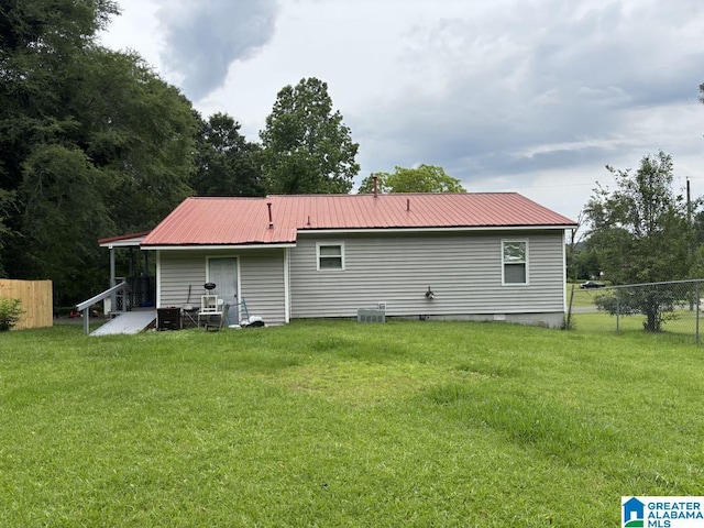 261 Ebenezer Rd, Odenville, AL 35120 - rear view of house with metal roof and cooling unit
