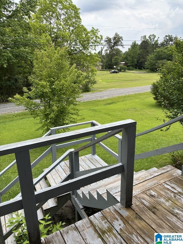 261 Ebenezer Rd, Odenville, AL 35120 - wooden terrace featuring a lawn