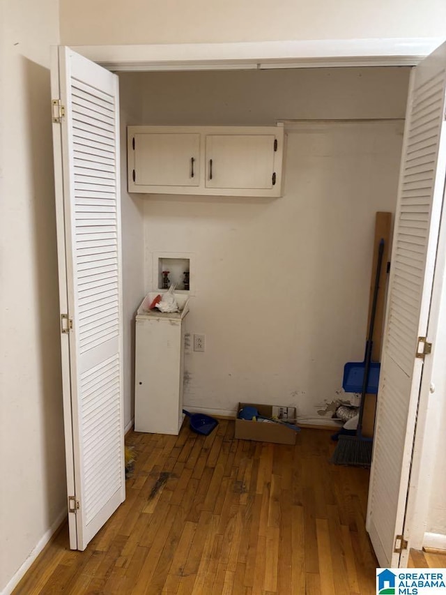261 Ebenezer Rd, Odenville, AL 35120 - washroom with hookup for a washing machine, hardwood / wood-style floors, and cabinet space