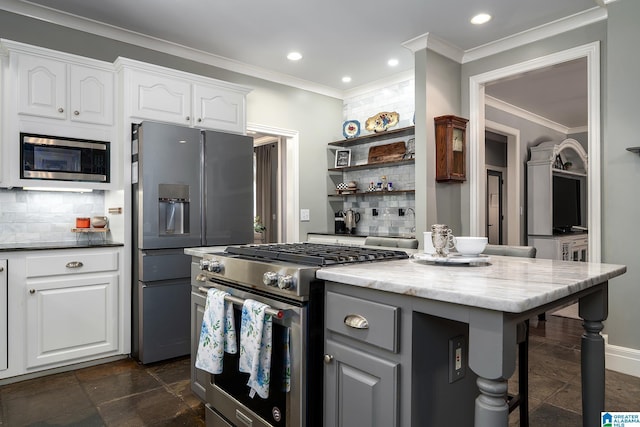 2300 Ridge Trl, Birmingham, AL 35242 - kitchen featuring stainless steel appliances, tasteful backsplash, open shelves, white cabinets, and crown molding
