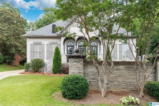 2300 Ridge Trl, Birmingham, AL 35242 - view of front of house with stucco siding, a front lawn, and roof with shingles